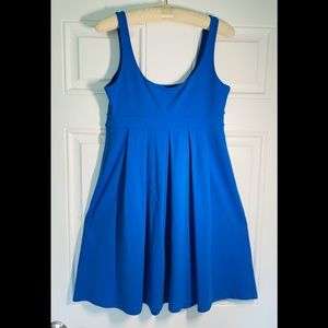 Clean, worn once, fitted mini dress. flattering, brilliant blue stretch fabric.